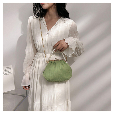 2024 NEW RETRO FAIRY SOLID COLOR SMALL BAG WHITE HAND HAND BAG PEARL 여자들의 직선 직물