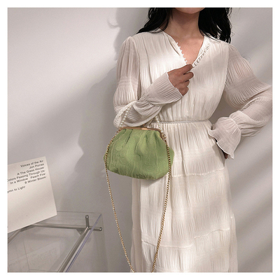 2024 NEW RETRO FAIRY SOLID COLOR SMALL BAG WHITE HAND HAND BAG PEARL 여자들의 직선 직물