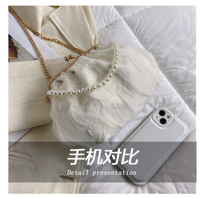 2024 NEW RETRO FAIRY SOLID COLOR SMALL BAG WHITE HAND HAND BAG PEARL 여자들의 직선 직물