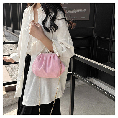 2024 NEW RETRO FAIRY SOLID COLOR SMALL BAG WHITE HAND HAND BAG PEARL 여자들의 직선 직물