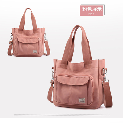 2024 NEW ATMOSPHERIC MOMMY BAG LARGE CAPITY 싱글 어깨 핸드 크로스보디 가방 나일론 천재 캐주얼 여자 어깨